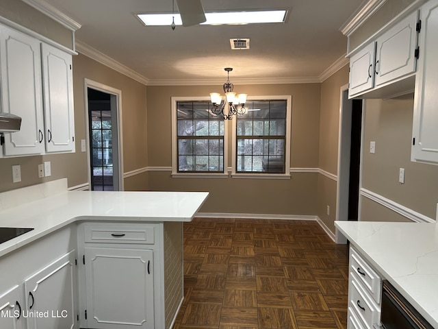 kitchen with kitchen peninsula, white cabinetry, dark parquet floors, and decorative light fixtures