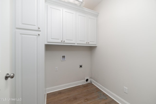 laundry room with cabinets, hookup for a washing machine, dark hardwood / wood-style floors, and hookup for an electric dryer