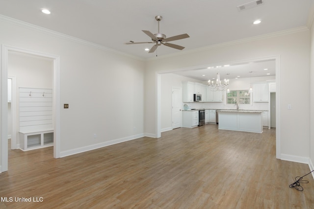 unfurnished living room featuring crown molding, ceiling fan with notable chandelier, and light wood-type flooring