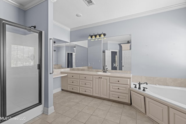 bathroom featuring ornamental molding, tile patterned floors, a stall shower, vanity, and a bath