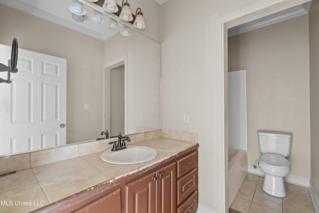 full bath with tile patterned floors, toilet, vanity, and baseboards