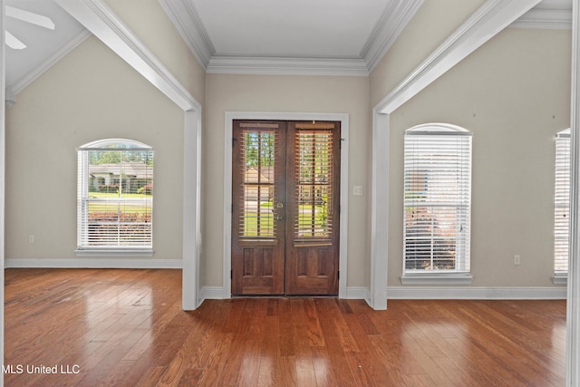 entryway featuring french doors, dark wood finished floors, baseboards, and crown molding