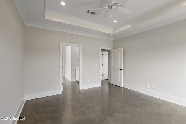 850 Glenwild Cir, Canton, MS 39046 - unfurnished room featuring a tray ceiling, crown molding, finished concrete floors, recessed lighting, and baseboards