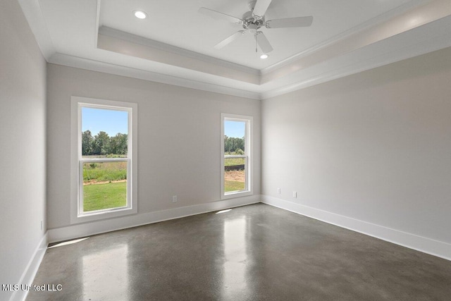 850 Glenwild Cir, Canton, MS 39046 - empty room with a tray ceiling, crown molding, concrete floors, baseboards, and recessed lighting