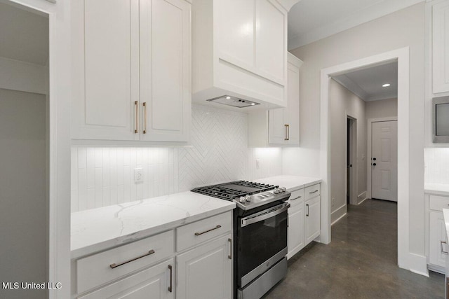 850 Glenwild Cir, Canton, MS 39046 - kitchen with stainless steel range with gas cooktop, tasteful backsplash, white cabinetry, concrete flooring, and light stone counters