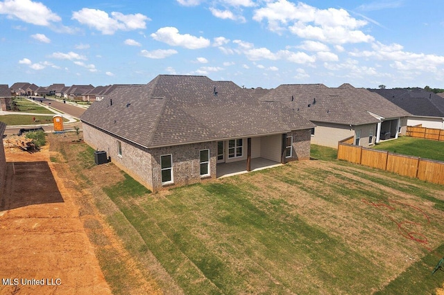 850 Glenwild Cir, Canton, MS 39046 - back of house with a patio area, a residential view, central AC unit, and brick siding