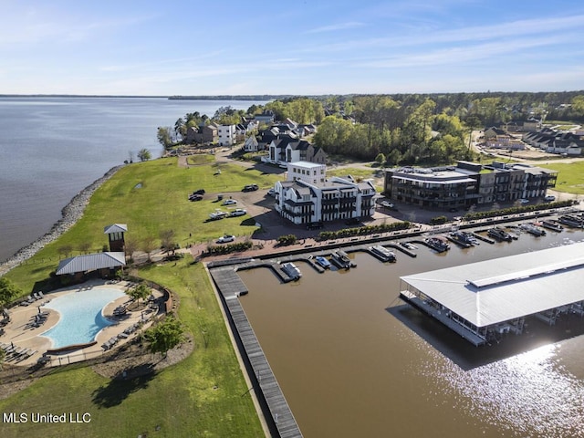 birds eye view of property featuring a water view