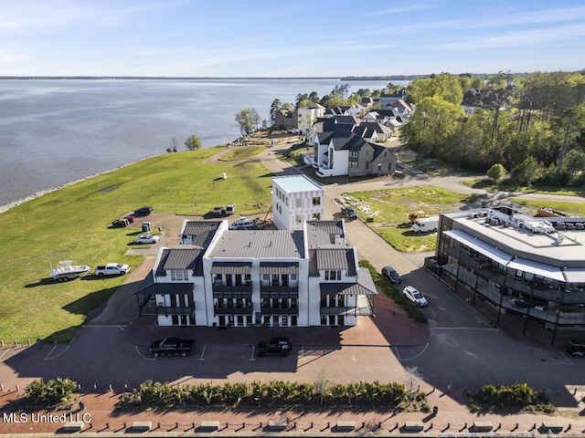 bird's eye view with a water view