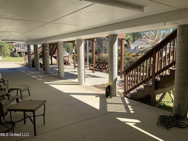 view of patio featuring stairs