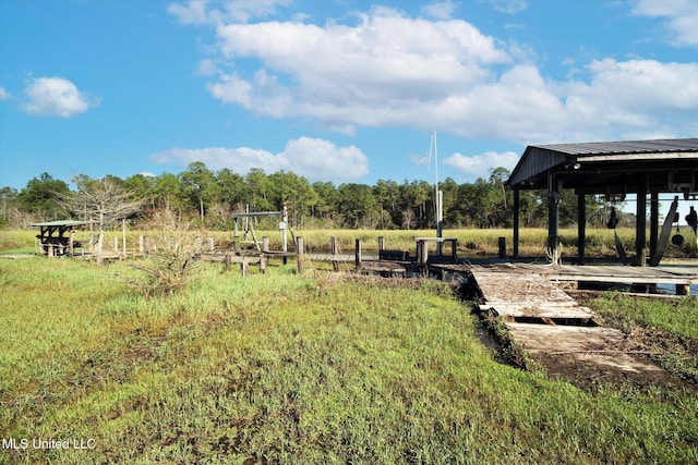 view of yard with a rural view