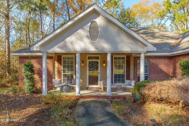 greek revival inspired property with covered porch