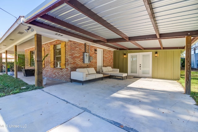 view of patio / terrace featuring an outdoor living space and french doors