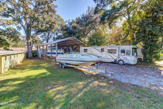 view of yard featuring a carport