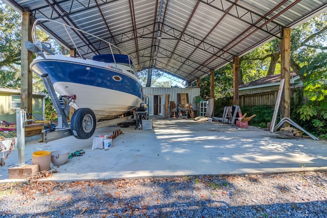 view of vehicle parking featuring a carport