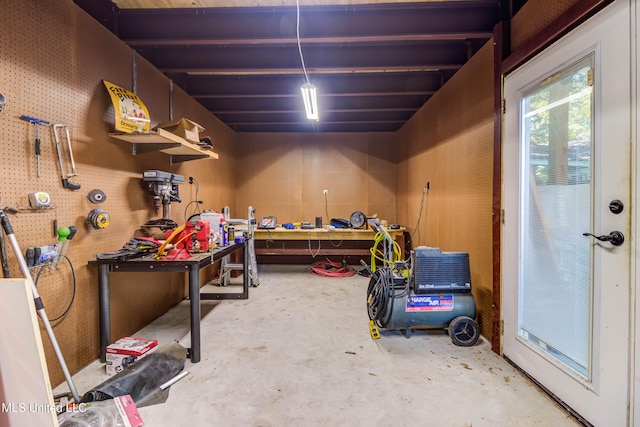 basement with a workshop area