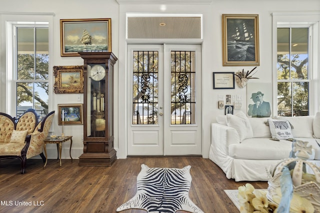 interior space with dark wood-style flooring and french doors