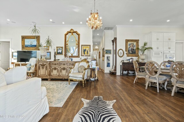 living area with recessed lighting, a notable chandelier, dark wood-style flooring, visible vents, and ornamental molding