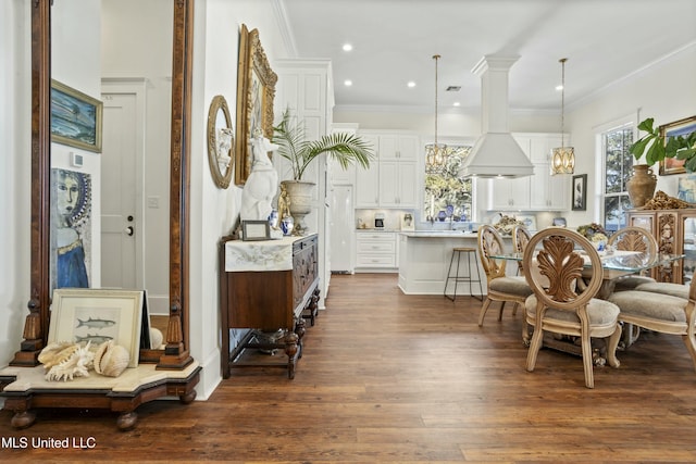 sitting room with ornamental molding, recessed lighting, dark wood-type flooring, and visible vents