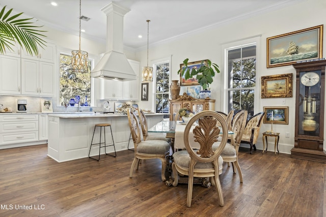 dining area featuring a wealth of natural light, visible vents, and dark wood-style flooring