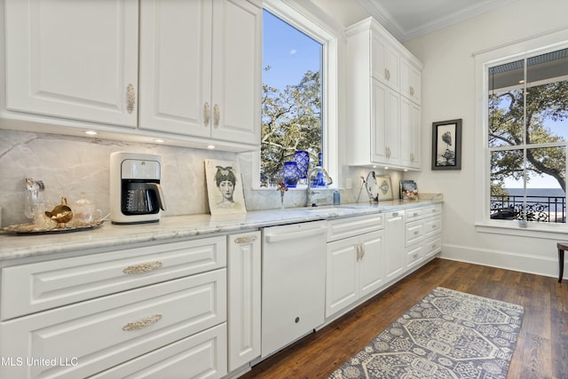 kitchen featuring dark wood-style flooring, white cabinetry, dishwasher, tasteful backsplash, and crown molding