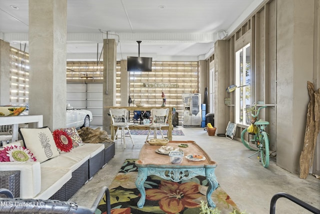 living room with concrete floors