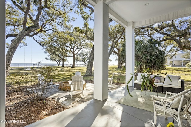 view of patio / terrace with fence and an outdoor hangout area