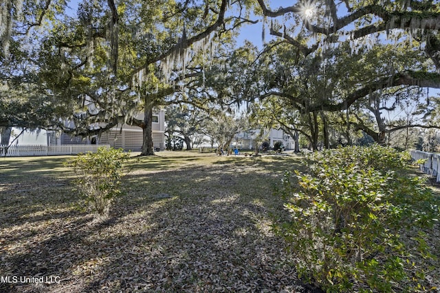 view of yard with fence