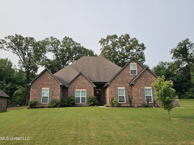 3545 Bailey Ln, Southaven, MS 38672 - craftsman-style house with brick siding, a front lawn, and roof with shingles