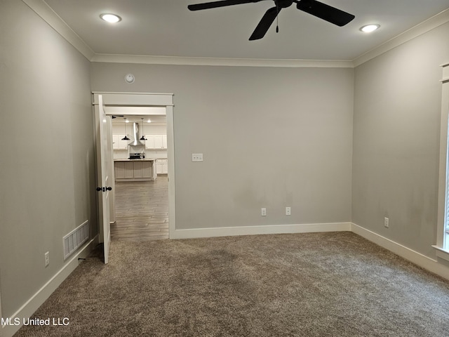 3545 Bailey Ln, Southaven, MS 38672 - carpeted empty room with ornamental molding, ceiling fan, baseboards, and recessed lighting