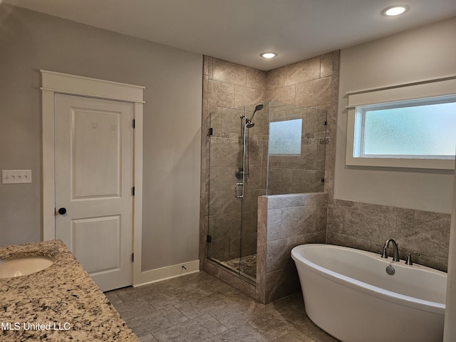3545 Bailey Ln, Southaven, MS 38672 - full bath featuring a shower stall, a soaking tub, recessed lighting, and vanity