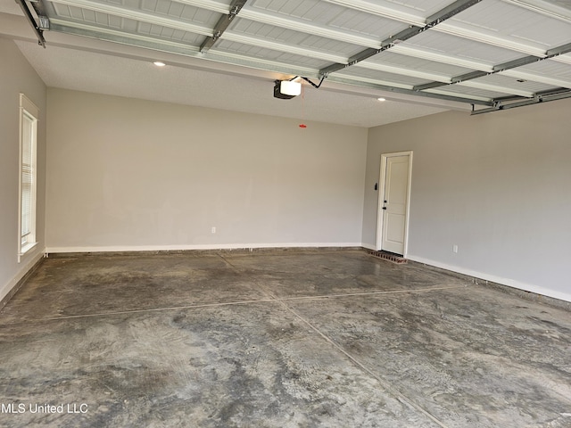 3545 Bailey Ln, Southaven, MS 38672 - garage with baseboards and a garage door opener