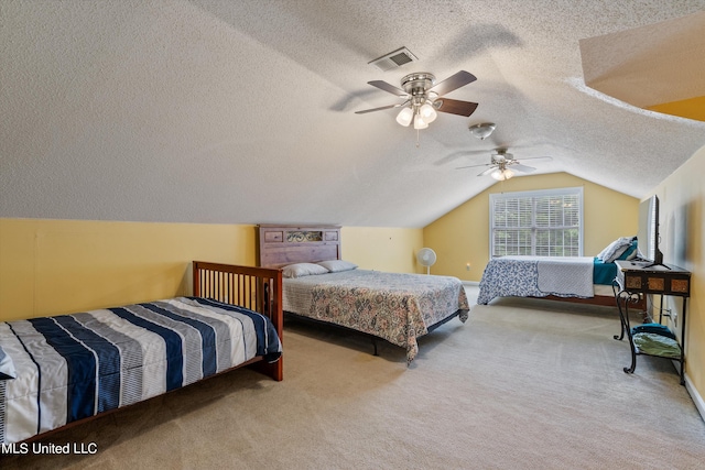 carpeted bedroom featuring lofted ceiling, a textured ceiling, and ceiling fan