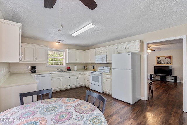 kitchen with white cabinetry, a textured ceiling, white appliances, and ceiling fan