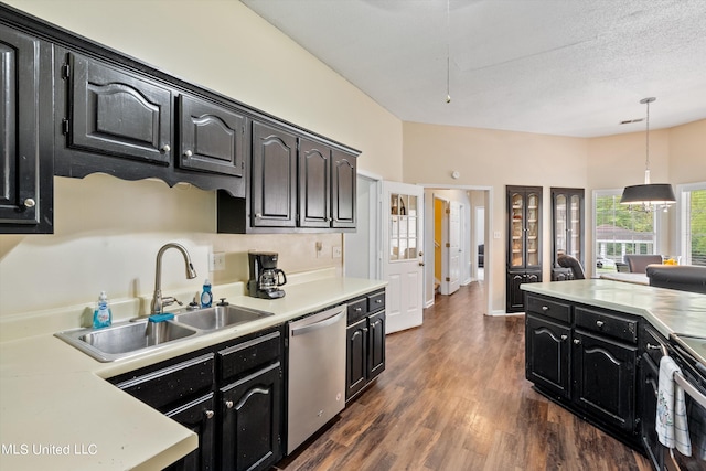 kitchen featuring dark wood-type flooring, sink, pendant lighting, stainless steel dishwasher, and electric stove