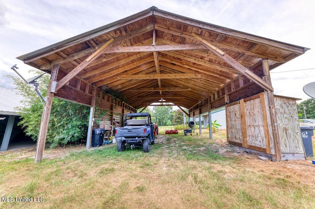 view of parking / parking lot with a carport