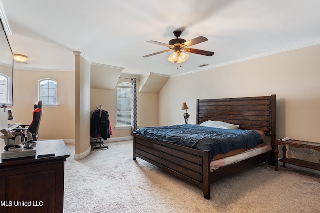 bedroom featuring ceiling fan, crown molding, and light colored carpet