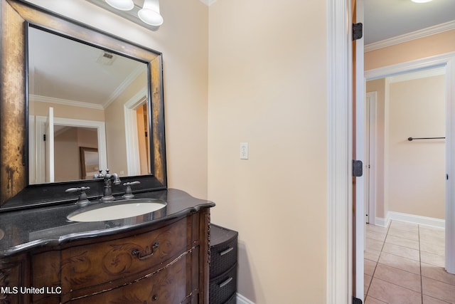 bathroom with ornamental molding, tile patterned flooring, and vanity