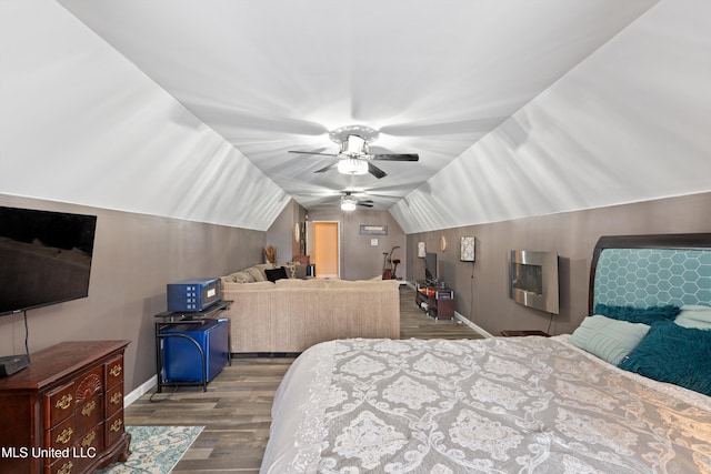 bedroom featuring vaulted ceiling, ceiling fan, and light hardwood / wood-style flooring