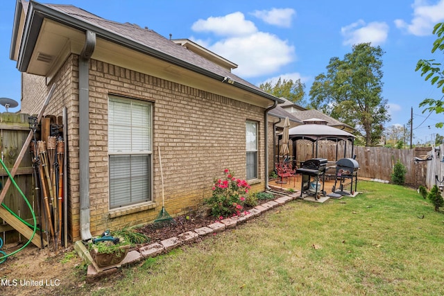 exterior space with a patio and a gazebo