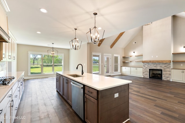 13721 Pebble Ridge Dr, Byhalia, MS 38611 - kitchen with a sink, stainless steel appliances, a chandelier, dark wood-style floors, and recessed lighting