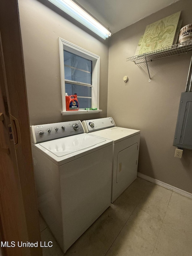 518 Main St, Natchez, MS 39120 - washroom featuring independent washer and dryer, baseboards, and light tile patterned flooring