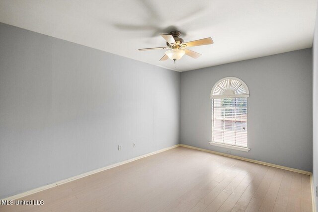 5155 Wayneland Dr Unit F6, Jackson, MS 39211 - spare room featuring ceiling fan, wood finished floors, and baseboards