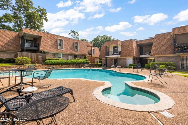 5155 Wayneland Dr Unit F6, Jackson, MS 39211 - community pool with a patio area