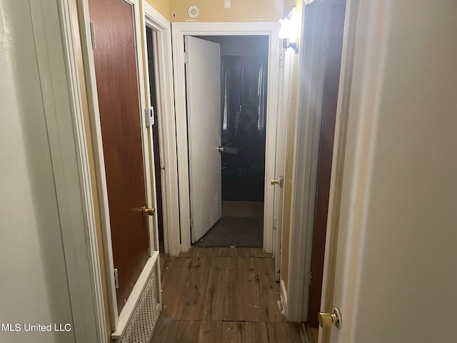 corridor featuring hardwood / wood-style flooring