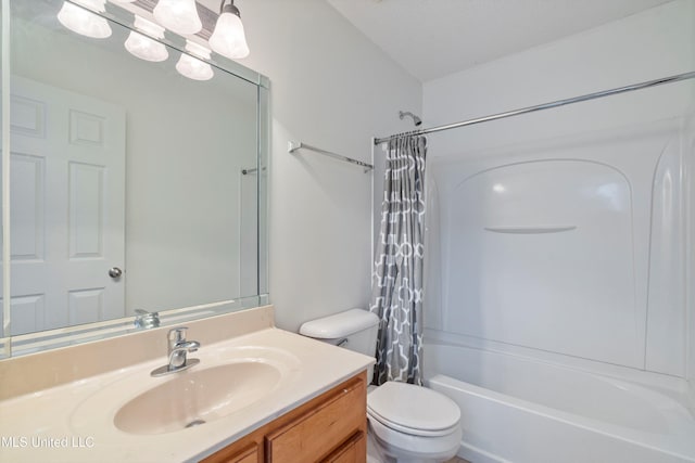 bathroom featuring toilet, vanity, and shower / bath combo