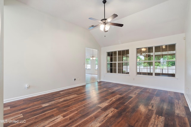 spare room with wood finished floors, baseboards, a ceiling fan, and high vaulted ceiling