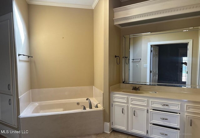 full bathroom featuring a bath, vanity, and ornamental molding