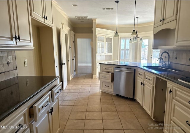 kitchen featuring a sink, visible vents, stainless steel dishwasher, and ornamental molding