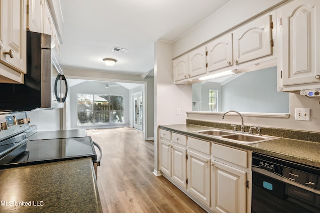 kitchen featuring sink, light hardwood / wood-style flooring, white cabinetry, and dishwasher