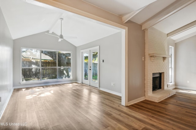 92 Hunter Dr, Ocean Springs, MS 39564 - unfurnished living room featuring a ceiling fan, wood finished floors, a fireplace, and baseboards